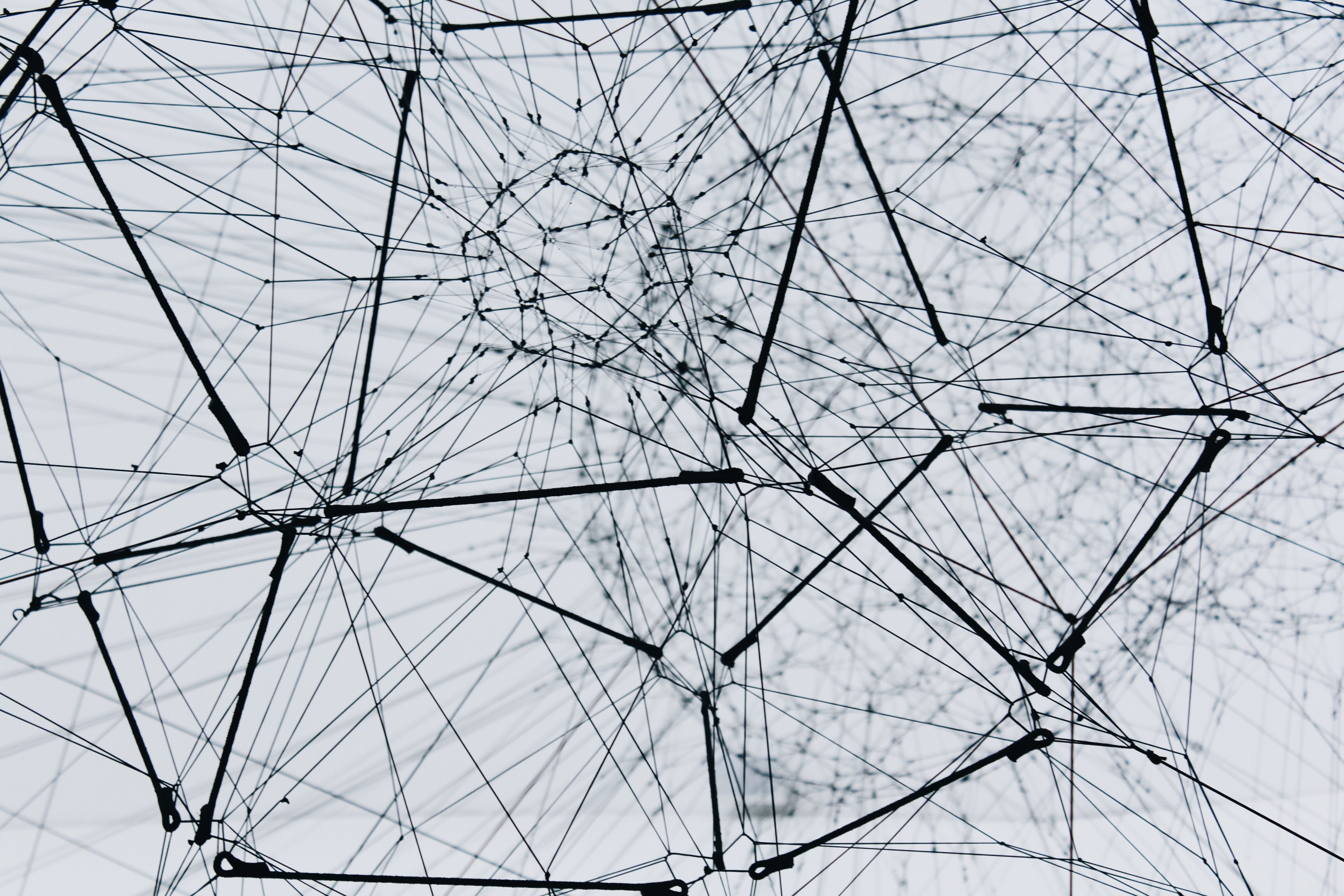 Neural network architecture diagram showing interconnected nodes and connections